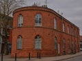 unusual Rounded red brick building