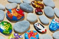 Rounded stones from sea vacation painted, souvenir made by kid