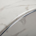 Rounded surface featuring a smooth, glossy finish with a subtle marble-like pattern. T Royalty Free Stock Photo