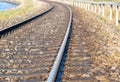 Rounding of railway abandoned rusty,. Empty turning single track of railways.