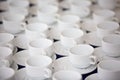 roup of empty Many rows of white ceramic coffee or tea cups