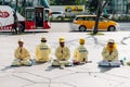 Roup of Falun Dafa people sitting on the walkway and practice for self improvement in Taipei, Taiwan Royalty Free Stock Photo