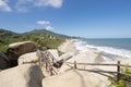 Roustic trekking path stairs with sierra nevada mountain range at background and caribbean sea Royalty Free Stock Photo