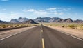 Route 66 highway road at midday clear sky desert mountains background landscape Royalty Free Stock Photo