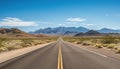 Route 66 highway road at midday clear sky desert mountains background landscape Royalty Free Stock Photo