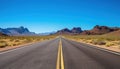 Route 66 highway road at midday clear sky desert mountains background landscape Royalty Free Stock Photo