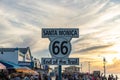 Route 66 Santa Monica Sign at Sunset Royalty Free Stock Photo