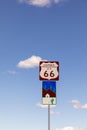 Route 66 sign under clear blue sky