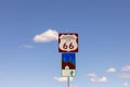Route 66 sign under clear blue sky