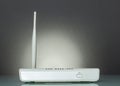 A router with WPS function on gray Royalty Free Stock Photo