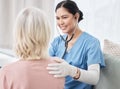 Routine checkups is as important as exercise and a healthy diet. a female doctor examining a patient with a stethoscope. Royalty Free Stock Photo