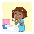 Lovely little black girl with dark brown hair - washing face