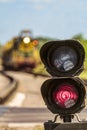 Routing traffic light with a red signal on railway