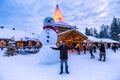 Rovaniemi - December 16, 2017: Travelers in the Santa Claus village of Rovaniemi, Finland