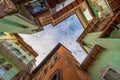 Rovereto street blue sky in small historic medieval town looking up