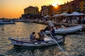 Batana boat parade at sunset in Rovinj, Croatia Royalty Free Stock Photo