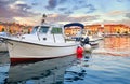 Rovinj, Croatia. Boat in harbor during sunrise in town Rovigno.