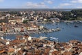 Aerial view of port with moored boats. Typical red ceramic roof tile, Rovinj, Croatia, Istria