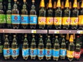 Rows of large plastic bottles of Croatian and European beer being sold at a local grocery store in Rovinj, Croatia.