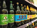 Rows of large plastic bottles of Croatian and European beer being sold at a local grocery store in Rovinj, Croatia.