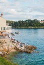 Rovinj, Croatia - May 30, 2019: people sitting in cafe at sea beach Royalty Free Stock Photo