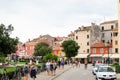 Rovinj, Croatia; 7/18/2019: Street in the old town of Rovinj, with traditional typical croatian houses at the background