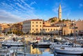 Rovinj old town, Croatia. Motorboats and on water. Royalty Free Stock Photo