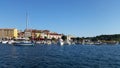 Harbor And City View. Rovinj Oldtown With Fishing Boat