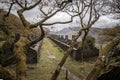 Row of abandoned old miners cottages in slate mine quarry Dinorwic North Wales. Eerie derelict barracks left behind Royalty Free Stock Photo