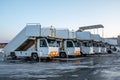 Row aircraft mobile gangway for boarding and disembarking passengers at the parking Royalty Free Stock Photo