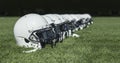 Row of American football Helmets before a game Royalty Free Stock Photo