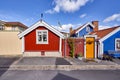 Row of ancient colorful wooden houses in the city