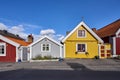 Row of ancient colorful wooden houses in the city