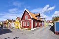 Row of ancient colorful wooden houses in the city