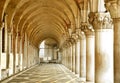 Row of arches underneath the Doge's Palace in Piazza San Marco in Venice. The famouse place in Venice Royalty Free Stock Photo