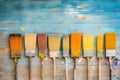 Row of artist paintbrushes closeup on artistic canvas Royalty Free Stock Photo