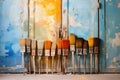 Row of artist paintbrushes closeup on artistic canvas Royalty Free Stock Photo