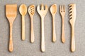 Row of assorted wooden kitchen utensils Royalty Free Stock Photo