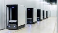 A row of autonomous robots navigating through a decontamination chamber utilizing advanced sensors to maintain sterile