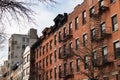 Row of Basic Old Brick Apartment and Residential Buildings in Greenwich Village of New York City Royalty Free Stock Photo