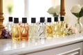 a row of bath oils and lotions arranged on a vanity Royalty Free Stock Photo