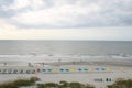 Row of beach chairs and colorful umbrellas at Myrtle Beach Royalty Free Stock Photo