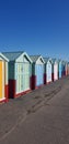 Row of beach huts along Hove seafront. Royalty Free Stock Photo