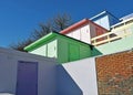 A row of beach huts with a blue sky background Royalty Free Stock Photo