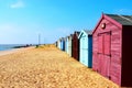 Row of beach huts on Suffolk coast line Royalty Free Stock Photo