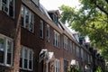 Row of Beautiful Similar Brick Homes in Sunnyside Queens New York Royalty Free Stock Photo