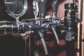 Row of Beer Taps in Pub. A side shot of a bar, pub installation and the draught beer pump handles Royalty Free Stock Photo