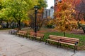 Row of Benches at Washington Square Park in Chicago during Autumn Royalty Free Stock Photo