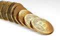 Row of bitcoins collapsing as domino effect. Uncertain bitcoin position on the market concept. Royalty Free Stock Photo