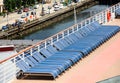 Row of Blue Chairs on Deck of Ship Royalty Free Stock Photo